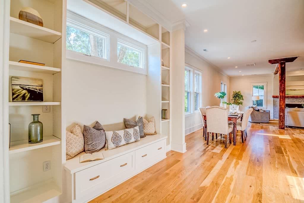 Window seat with drawers between built-in bookcases