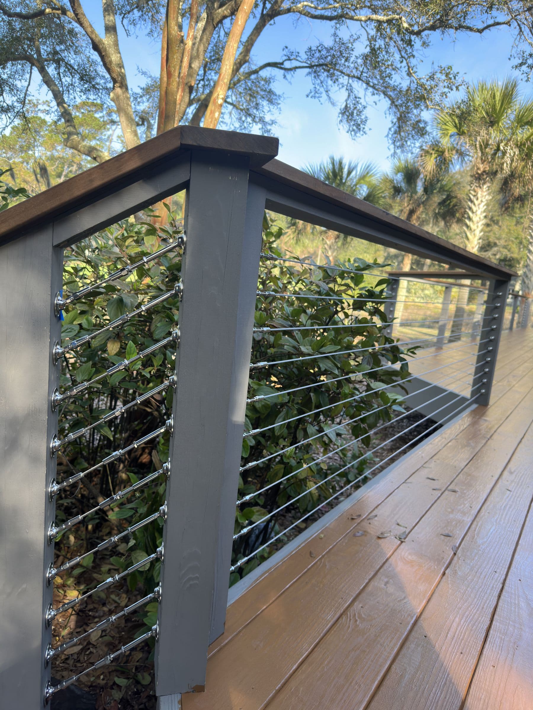 Cable railing detail on a hardwood deck