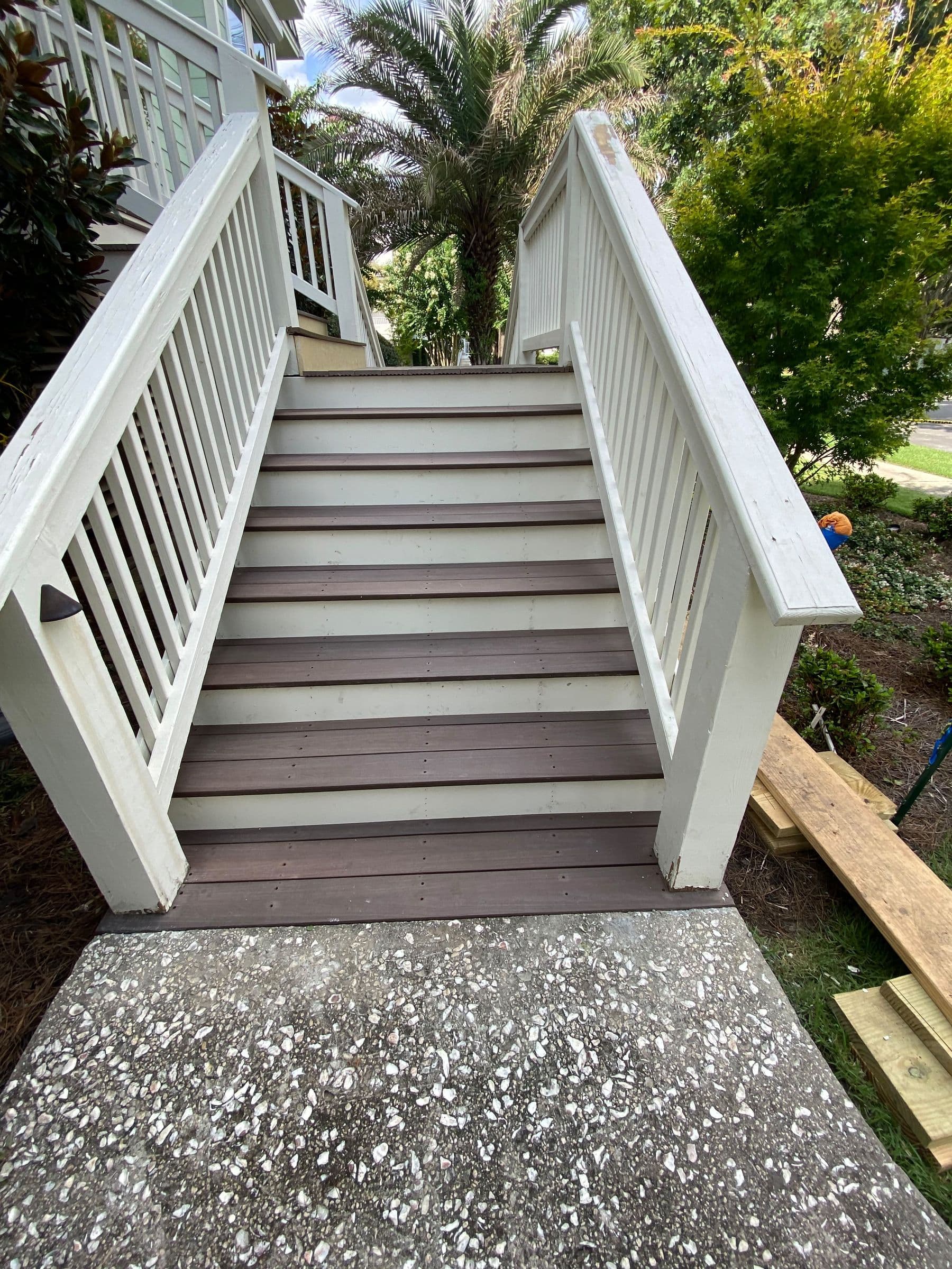 Rebuilt composite entry stair with white railings
