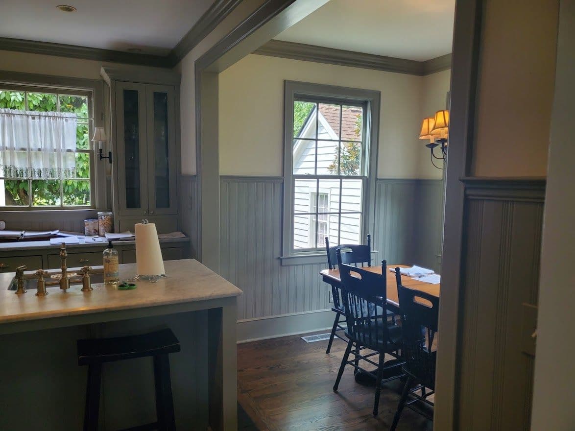 Dining nook with painted wainscoting and trim