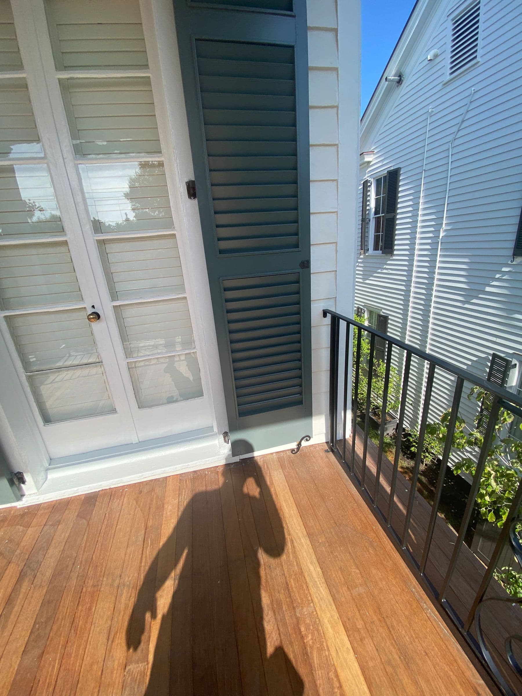 French doors opening onto a pool deck