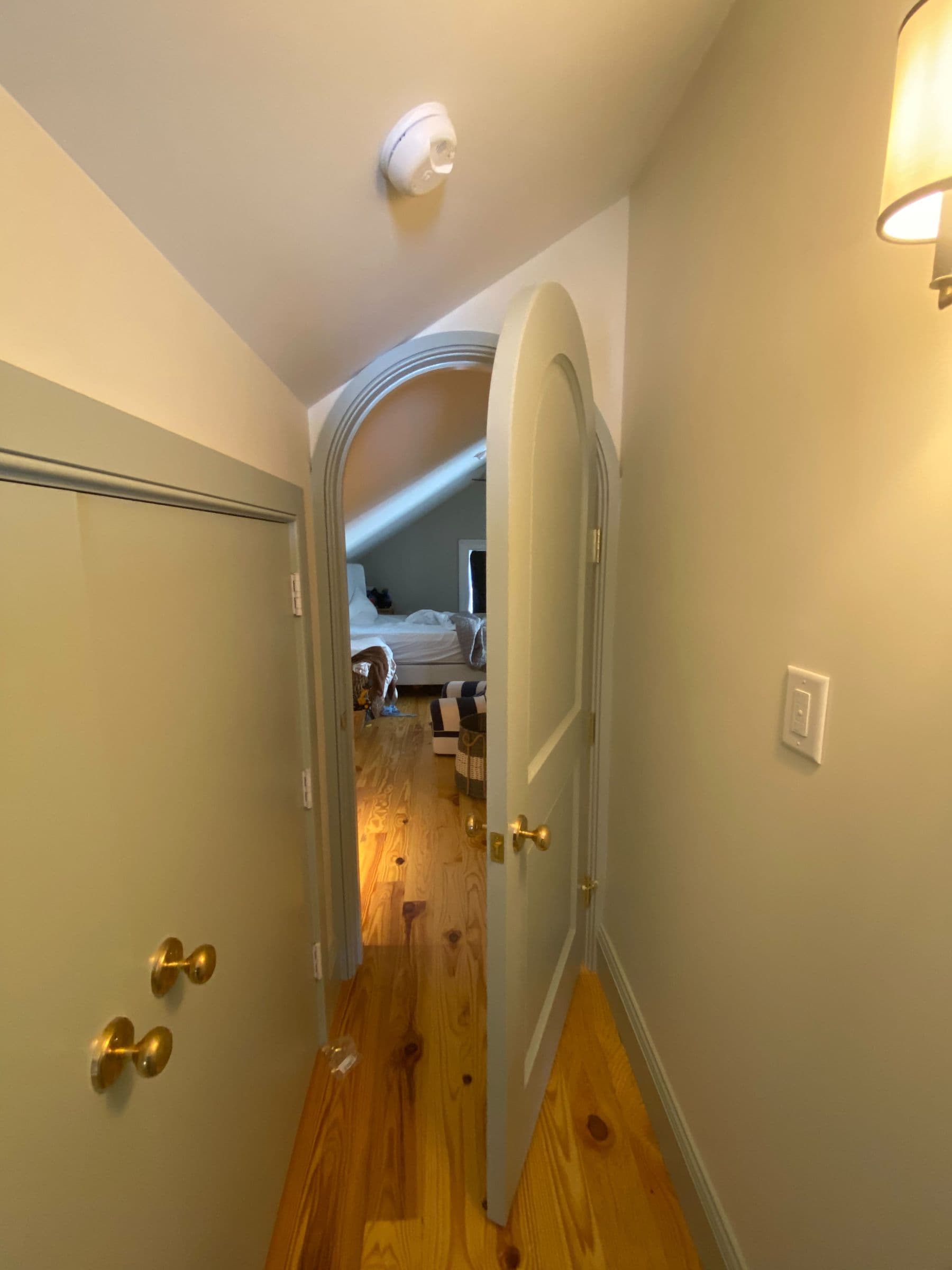 Painted louvered shutters and trim on a finished interior